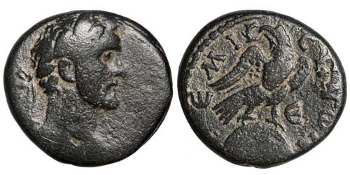 A bronze provincial coin of the emperor Antoninus Pius from Emesa with a reverse showing the sacred stone of Elagabal.