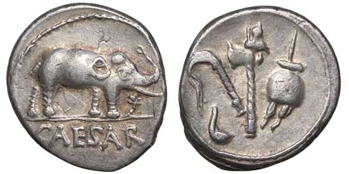 A silver denarius of Julius Caesar showing an elephant trampling a serpent and emblems of the Pontificate