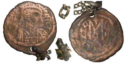 A bronze Byzantine follis of Mauruce Tiberius with hole and chain
