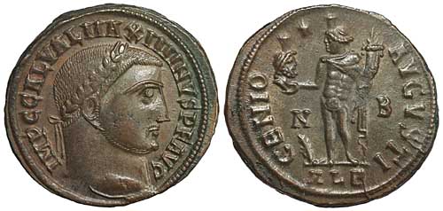 A billon follis of the emperor Maximinus II with a reverse showing Genius holding the head of Serapis