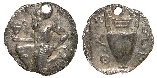 A silver obol or trihemiobol of Thasos showing a tailed satyr and a volute krater