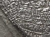 Detail from the obverse of a Corinthian stater showing crystallisation