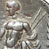 Detail of the reverse of a tetradrachm of Maroneia showing Dionysos carrying two narthex wands