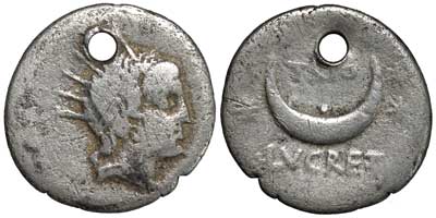 A holed Republican denarius with a reverse showing moon and stars.