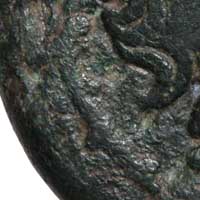 Detail of the obverse of a bronze coin from Pella showing the head of Pan