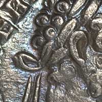 Detail of the obverse of a denarius of Septimius Severus with multicoloured toning