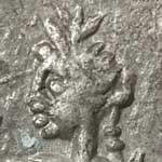 The head of Spes showing her headdress, from the reverse of a silver denarius of Septimius Severus